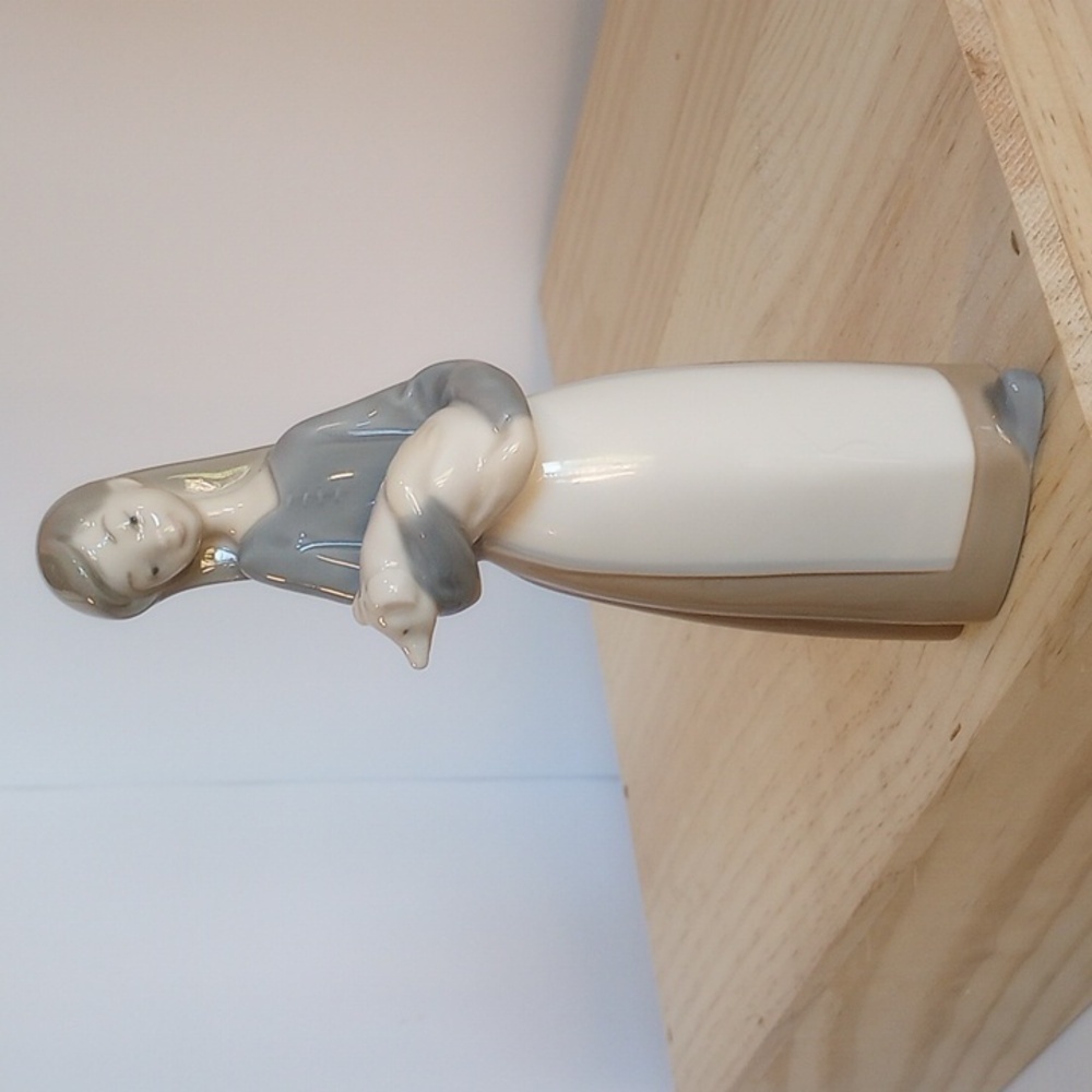 Lladro girl with pig 7 inches